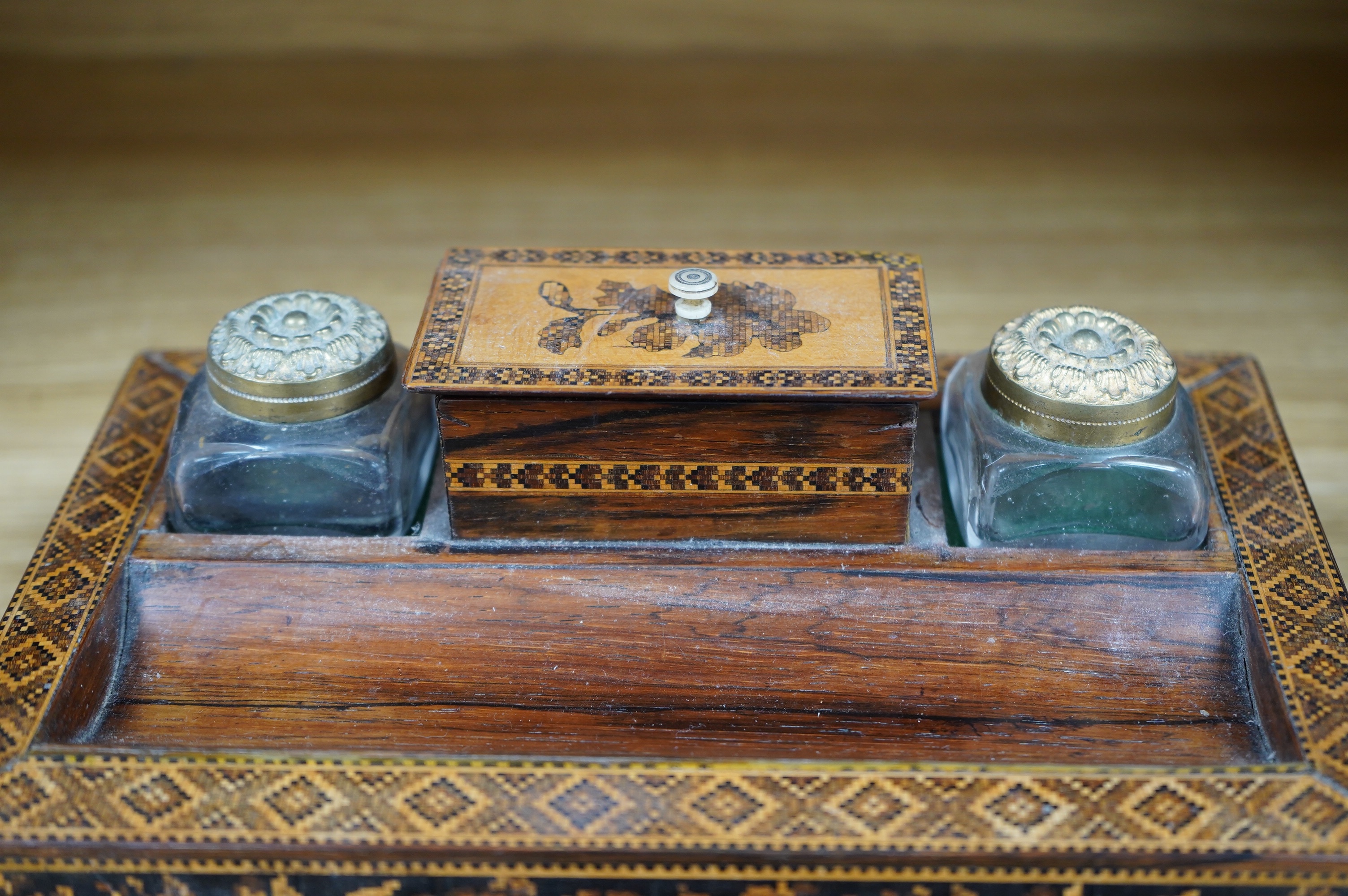 A Tunbridgeware rosewood inkstand with two glass ink bottles, 26cm wide. Condition - fair